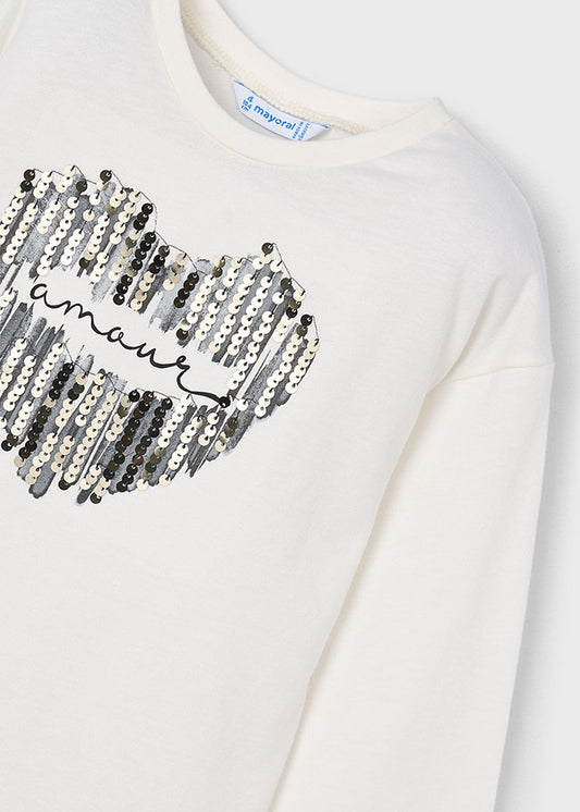 Camisola de manga comprida com coração de lantejoulas para menina Mayoral em Cru e Preto - detalhe